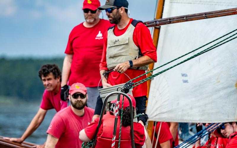 Crew of log canoe Silver Heel by Paul Hanley