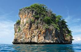 Ko Doc Mai is a typical limestone pinnacle, but this one is particularly good for diving. Photo by Michaela Urban