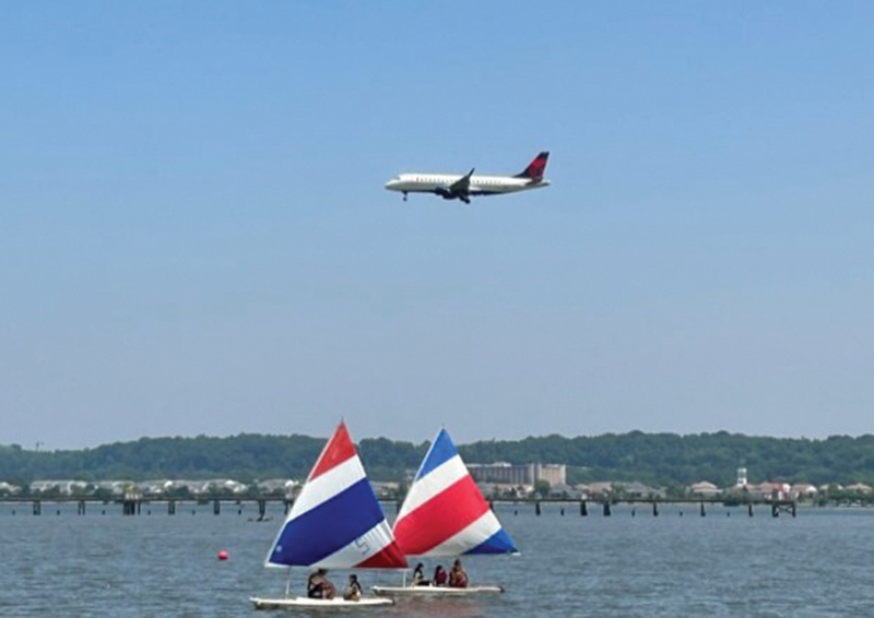 wind, small sailboats and airplanes 