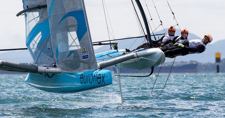 They look very calm for three guys sailing an unhinged lunatic of a boat. -- photo courtesy of superfoiler.com