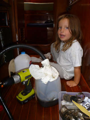 Changing the oil under the stairs.