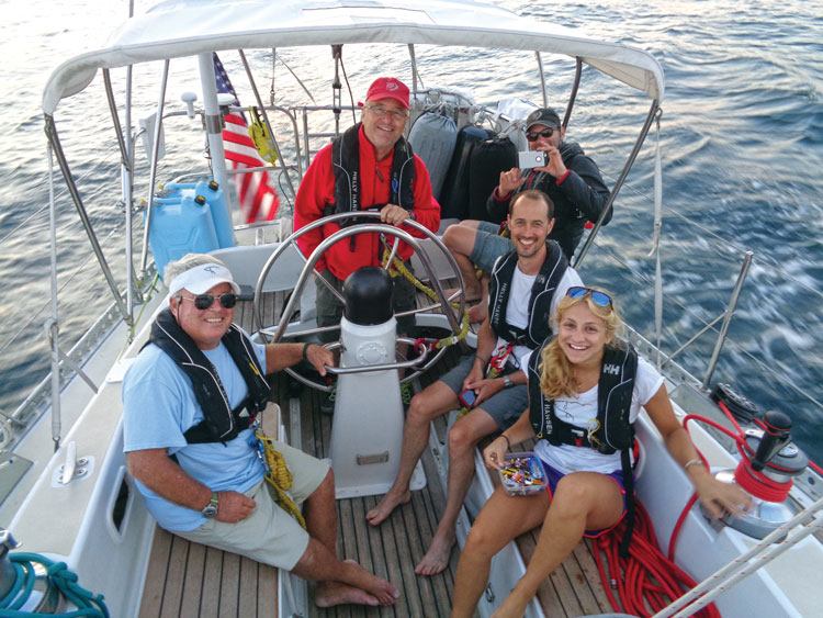 Capt. Dennis and crew Jim, Lance, Bruce, and Liz sailed up to Nova Scotia while Andy recovered ashore. Mia behind the camera.