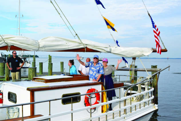 Buck Buchanan and Carol Sisco bring the skipjack home. Photos courtesy of AMM